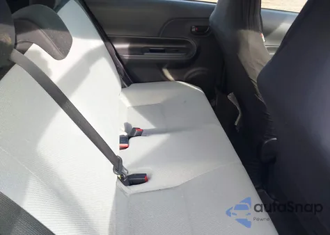 2015 Toyota Prius C One from USA, damaged, VIN JTDKDTB30F1100138